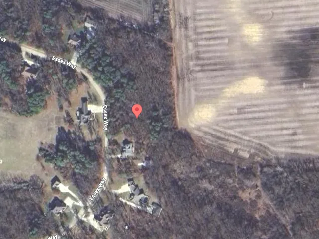 a view of the house and a yard