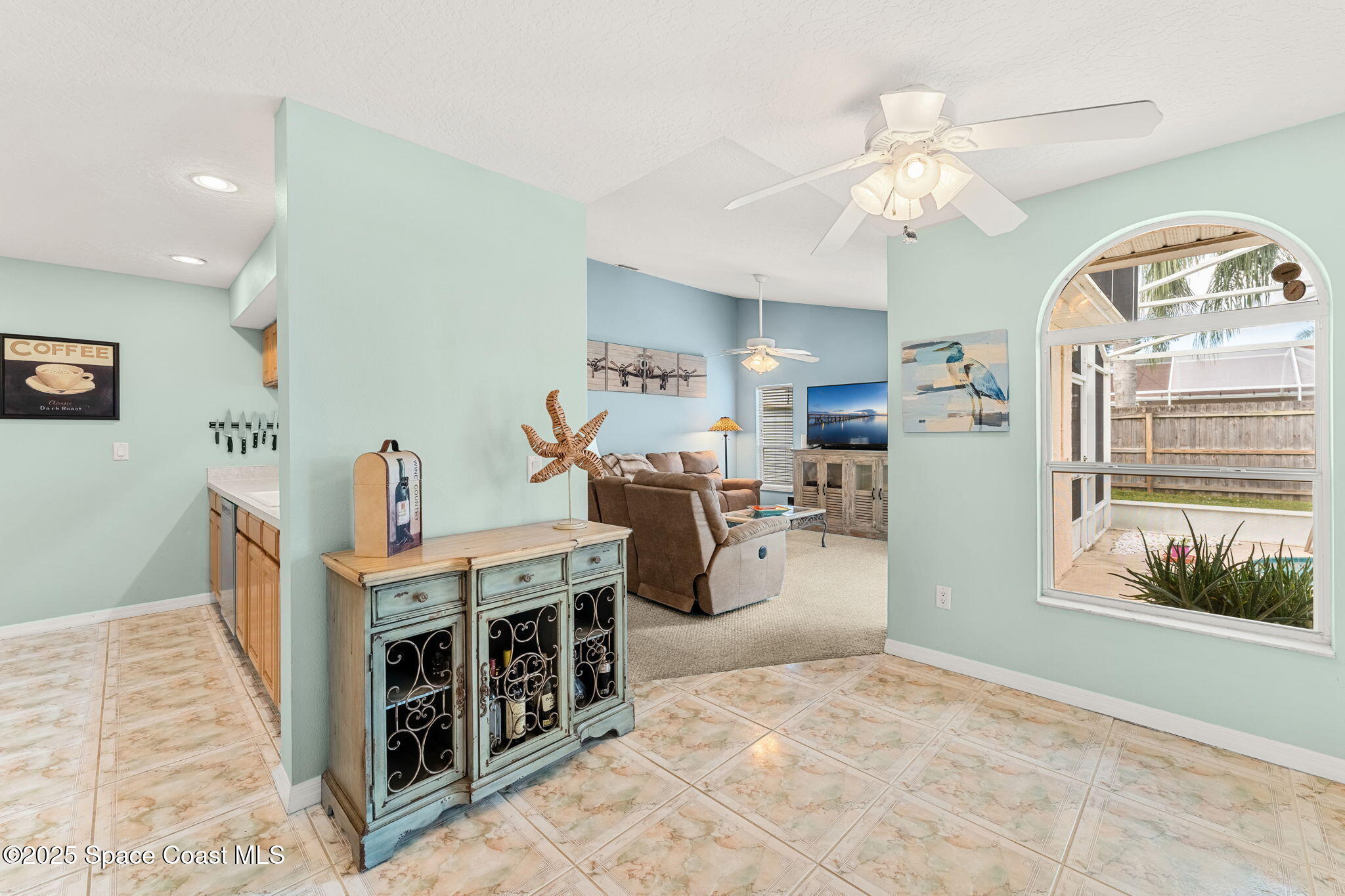 1020 Pelican Lane Rockledge, FL 32955 - Photo 11 of 36 a view of a livingroom with furniture and windows