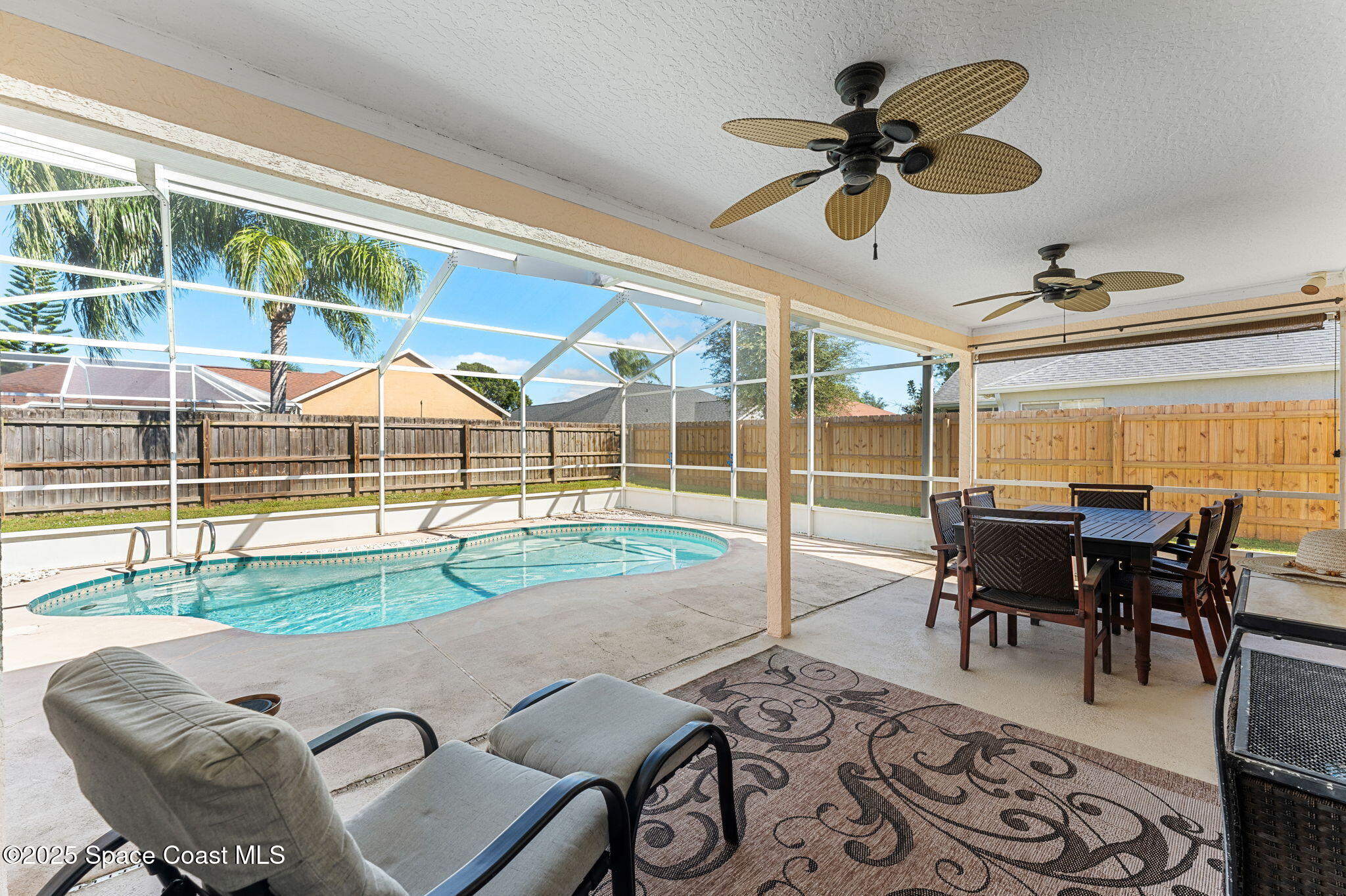 1020 Pelican Lane Rockledge, FL 32955 - Photo 2 of 36 a view of a dining room with furniture window and outside view