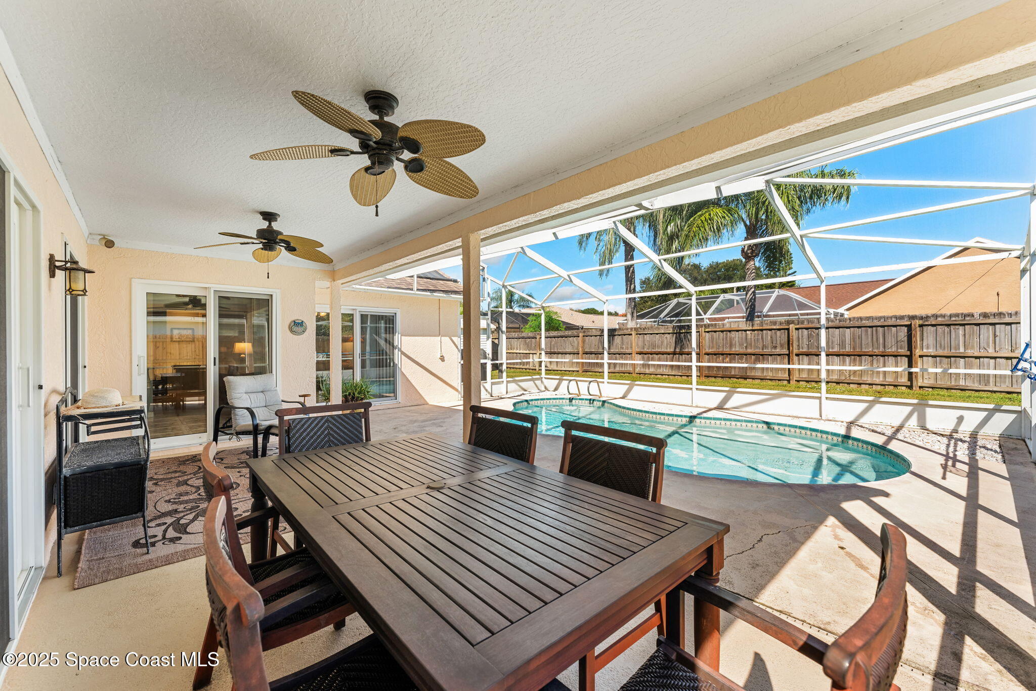 1020 Pelican Lane Rockledge, FL 32955 - Photo 22 of 36 a view of a dining room with furniture window and outside view