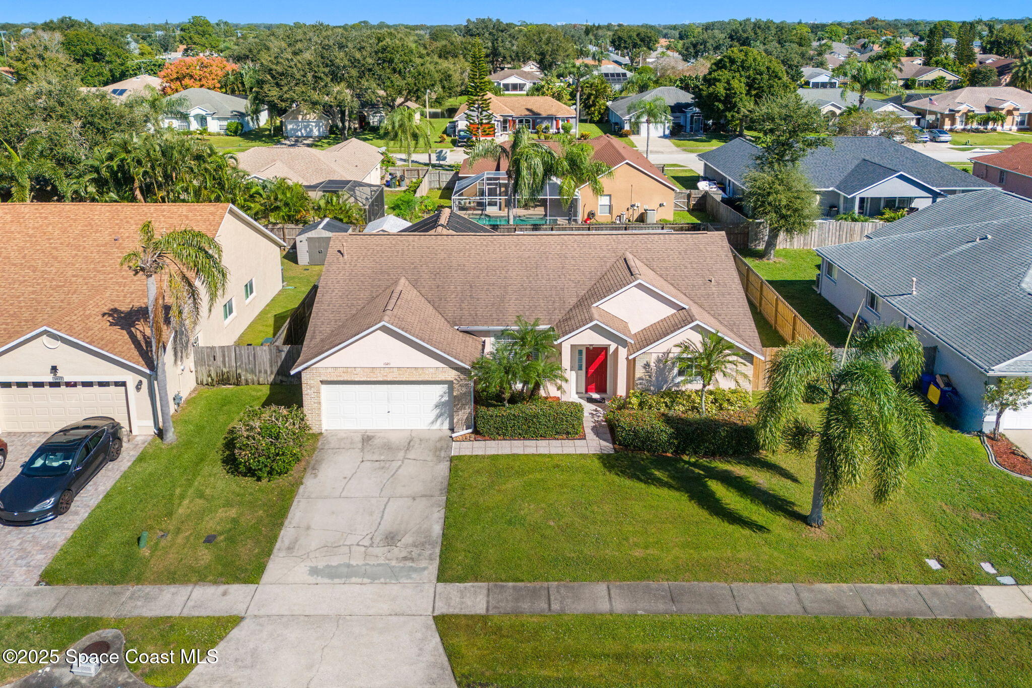 1020 Pelican Lane Rockledge, FL 32955 - Photo 29 of 36 an aerial view of residential houses with outdoor space and street view