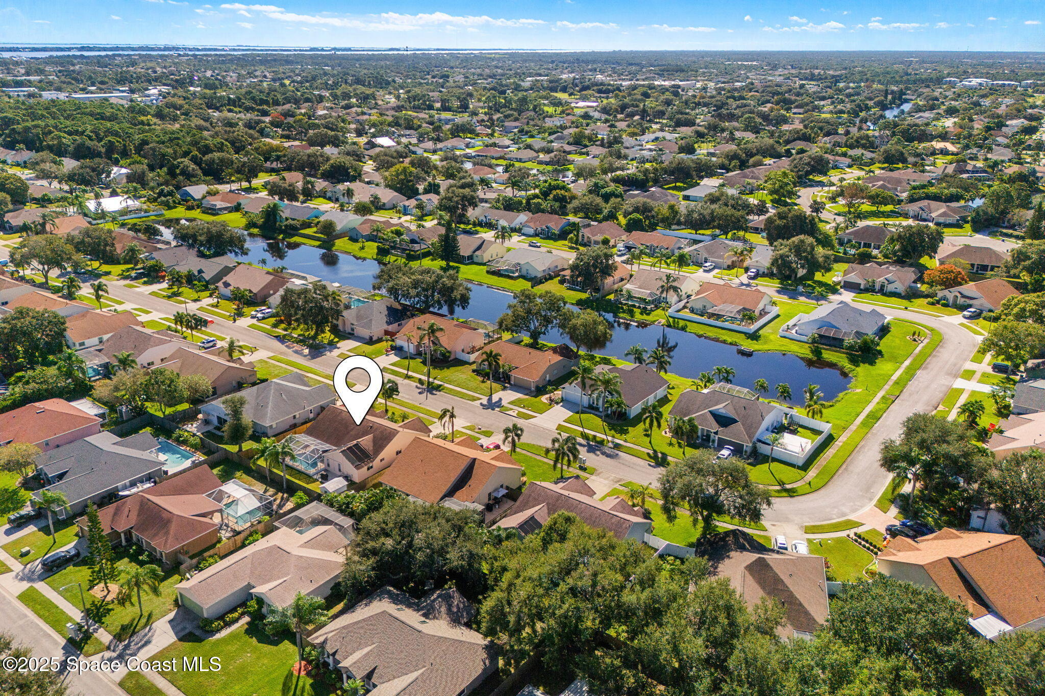 1020 Pelican Lane Rockledge, FL 32955 - Photo 35 of 36 an aerial view of residential houses with outdoor space