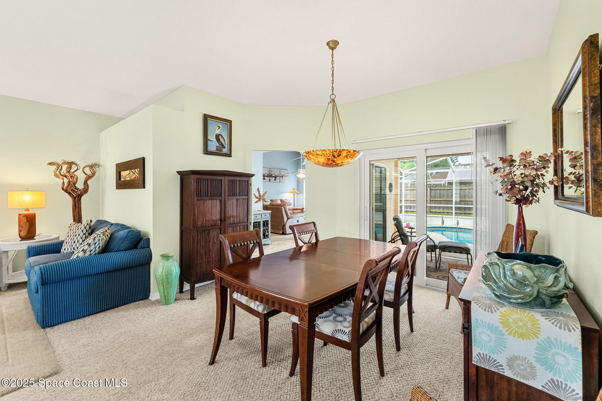 1020 Pelican Lane Rockledge, FL 32955 - Photo 7 of 36 a view of a livingroom with furniture and window