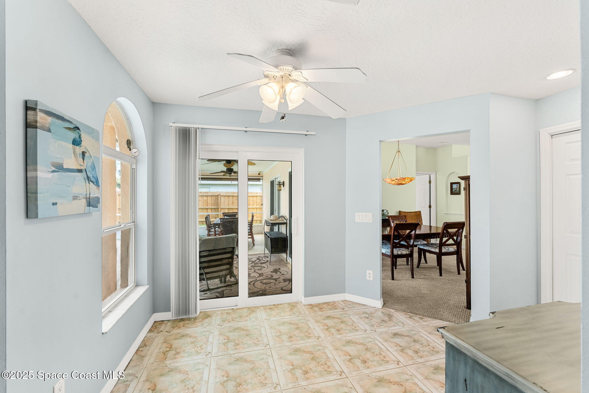 1020 Pelican Lane Rockledge, FL 32955 - Photo 10 of 36 a view of a livingroom with furniture and a window
