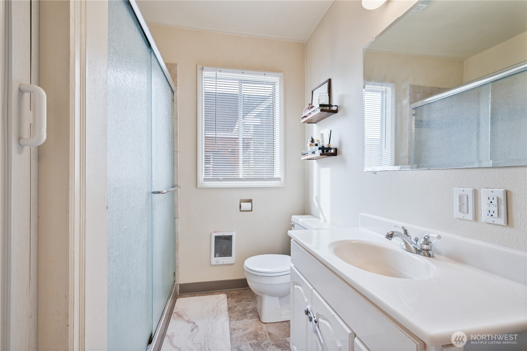 467 19th Avenue Longview, WA 98632 - Photo 15 of 30 a bathroom with a granite countertop sink toilet and shower