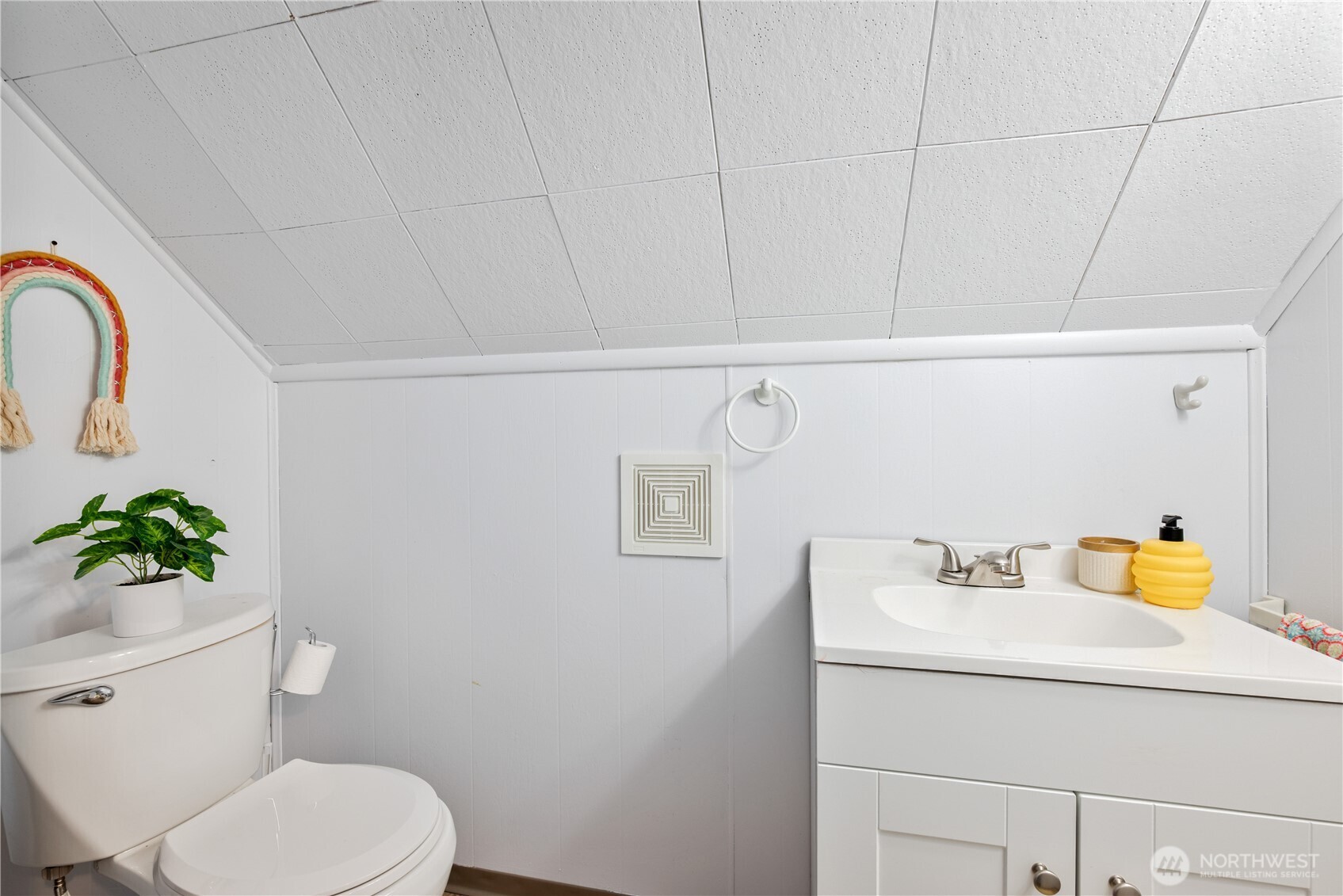 467 19th Avenue Longview, WA 98632 - Photo 22 of 30 a bathroom with a sink mirror vanity and toilet