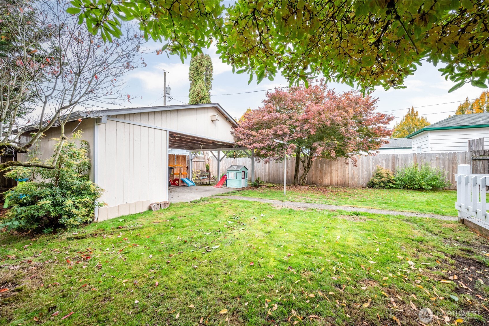 467 19th Avenue Longview, WA 98632 - Photo 29 of 30 a view of a house with backyard and a tree