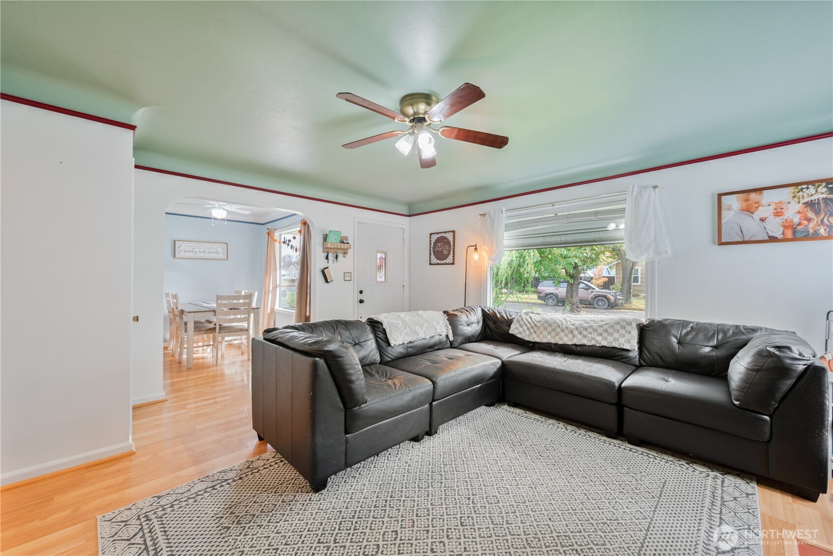 467 19th Avenue Longview, WA 98632 - Photo 7 of 30 a living room with furniture and a large window