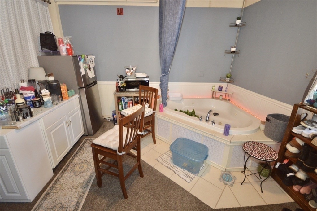 720 Kearsarge Road Conway, NH 03845 - Photo 16 of 21 a view of a workspace with furniture and toys