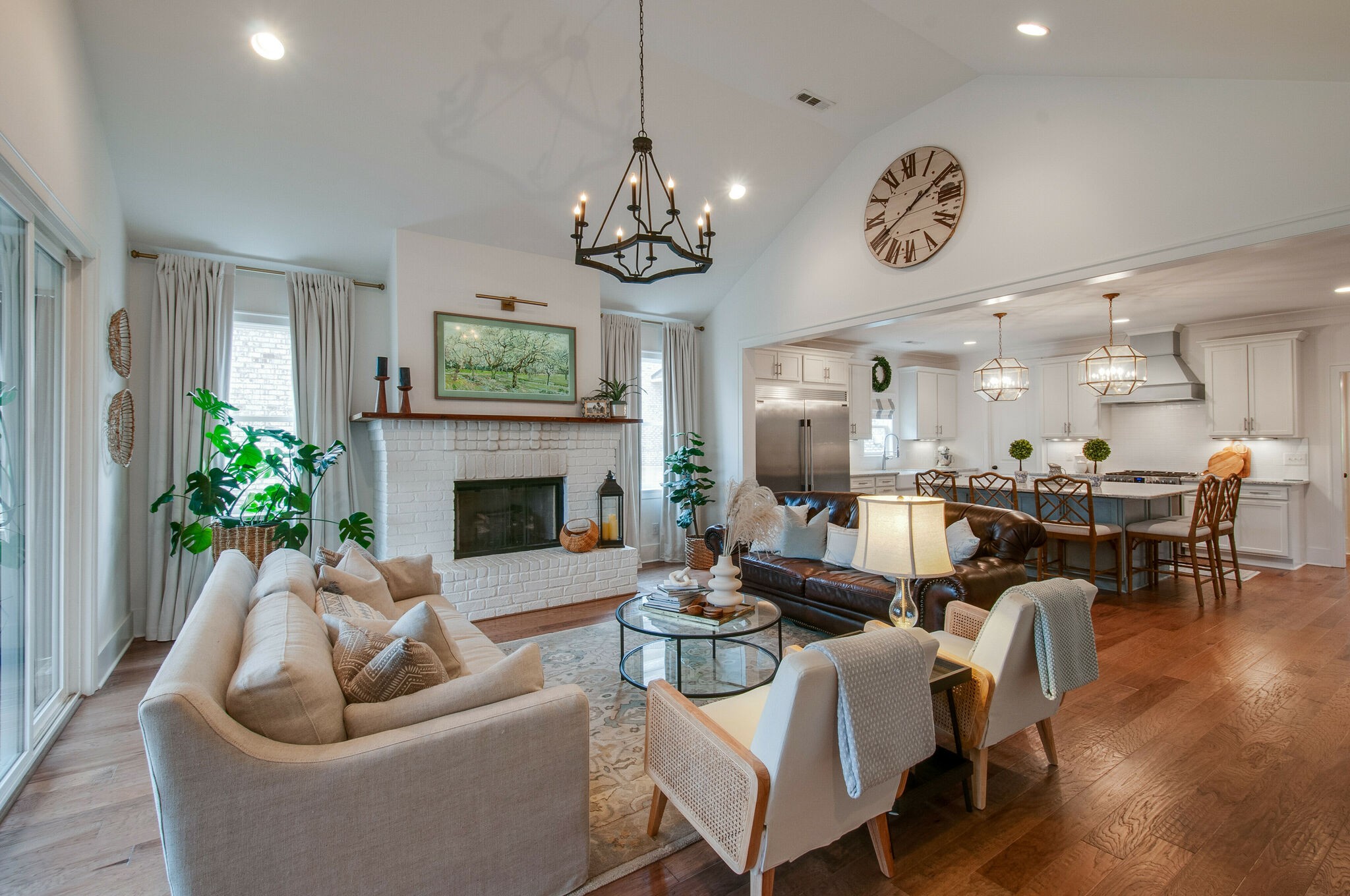 430 Beamon Drive Franklin, TN 37064 - Photo 19 of 62 a living room with furniture a fireplace and a chandelier