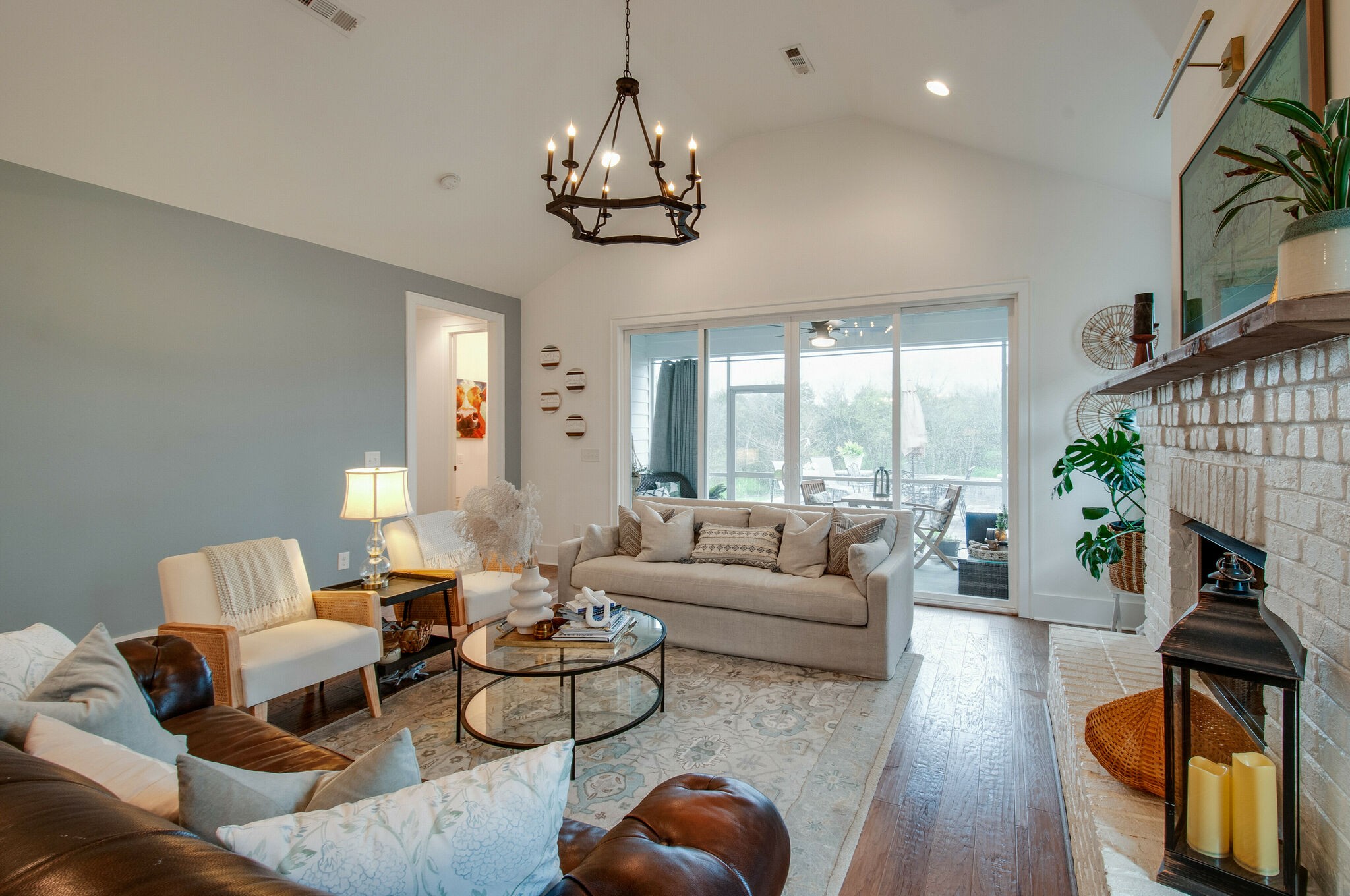 430 Beamon Drive Franklin, TN 37064 - Photo 20 of 62 a living room with furniture a chandelier and a fireplace