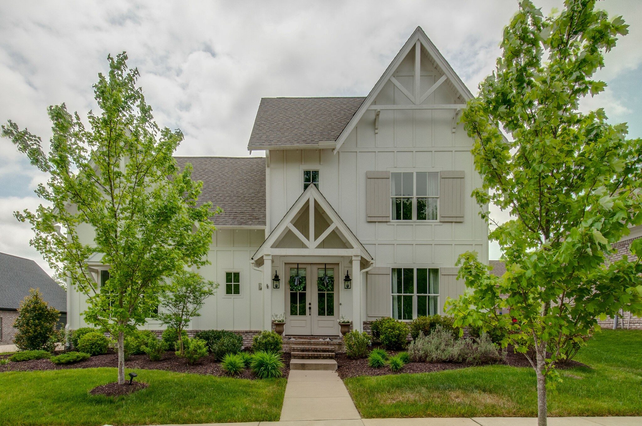430 Beamon Drive Franklin, TN 37064 - Photo 2 of 62 a view of house with garden and tall trees