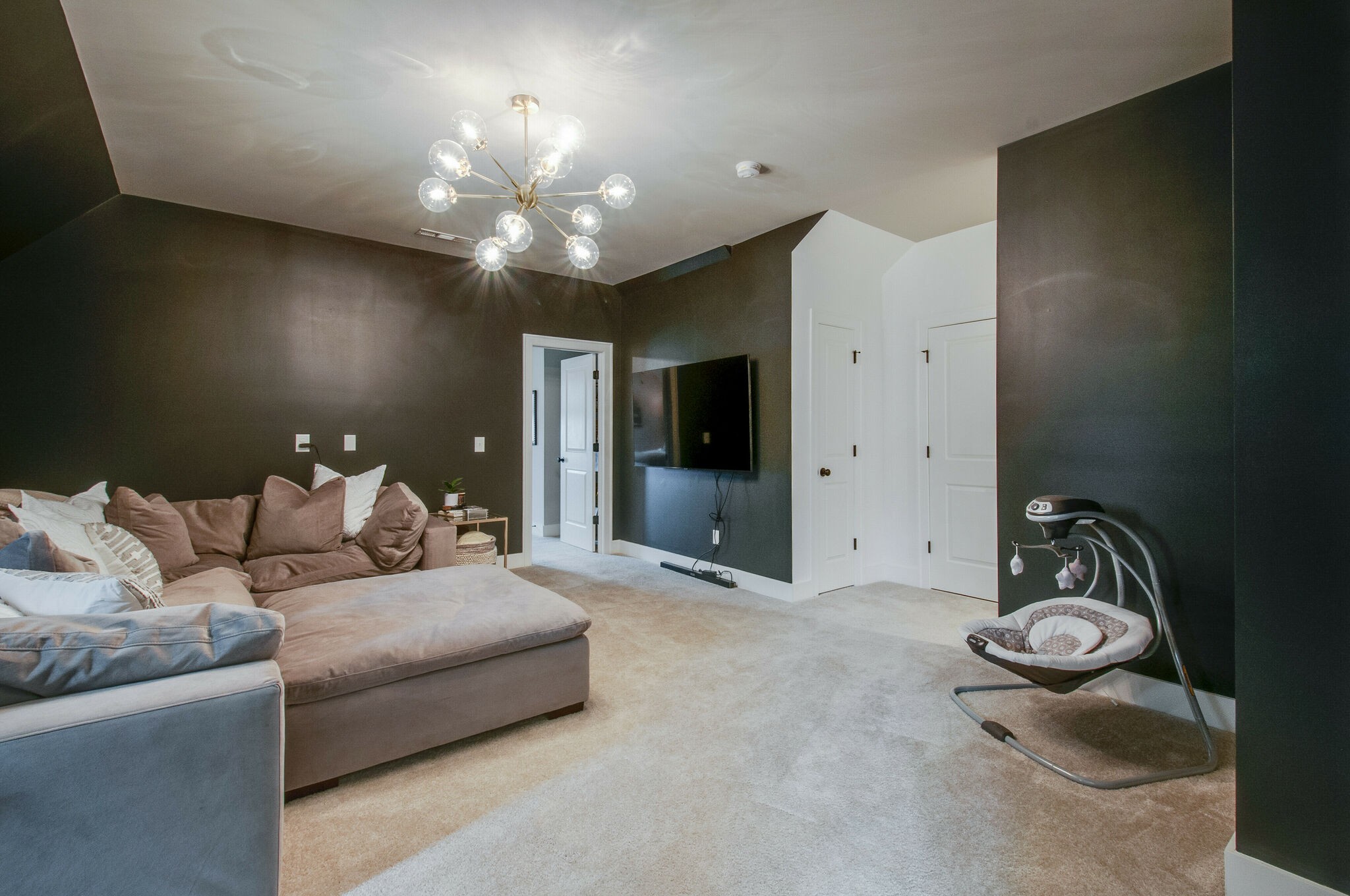430 Beamon Drive Franklin, TN 37064 - Photo 36 of 62 a living room with furniture a chandelier and a mirror