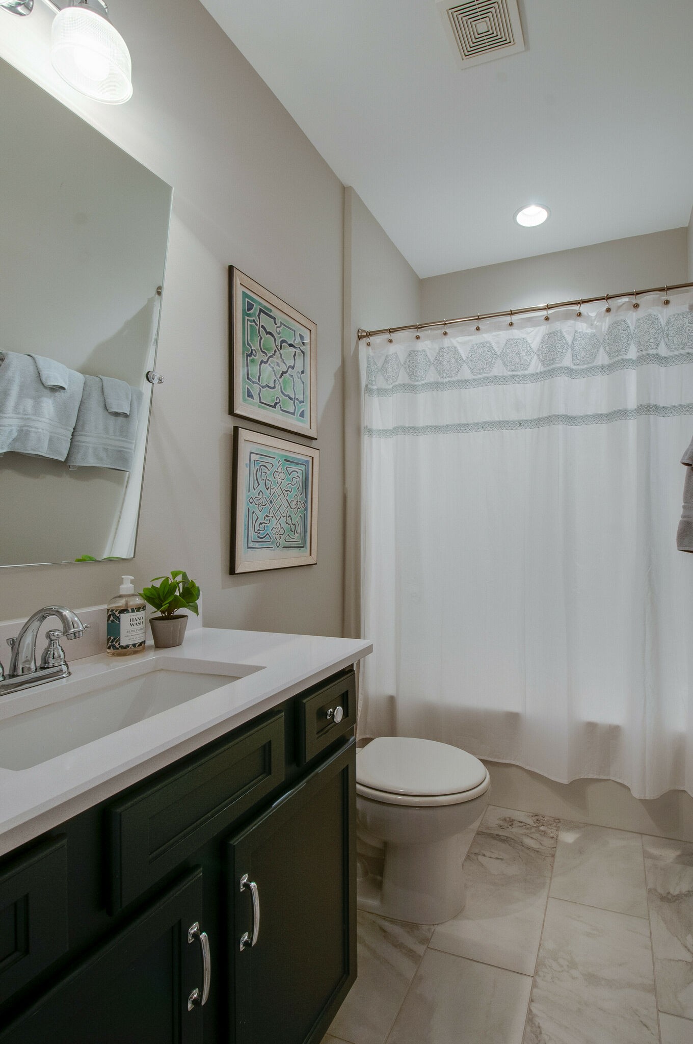 430 Beamon Drive Franklin, TN 37064 - Photo 39 of 62 a bathroom with a sink a toilet and shower