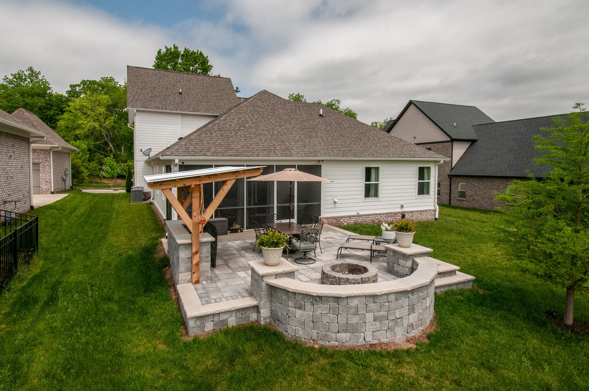 430 Beamon Drive Franklin, TN 37064 - Photo 51 of 62 a view of a house with backyard sitting area and garden