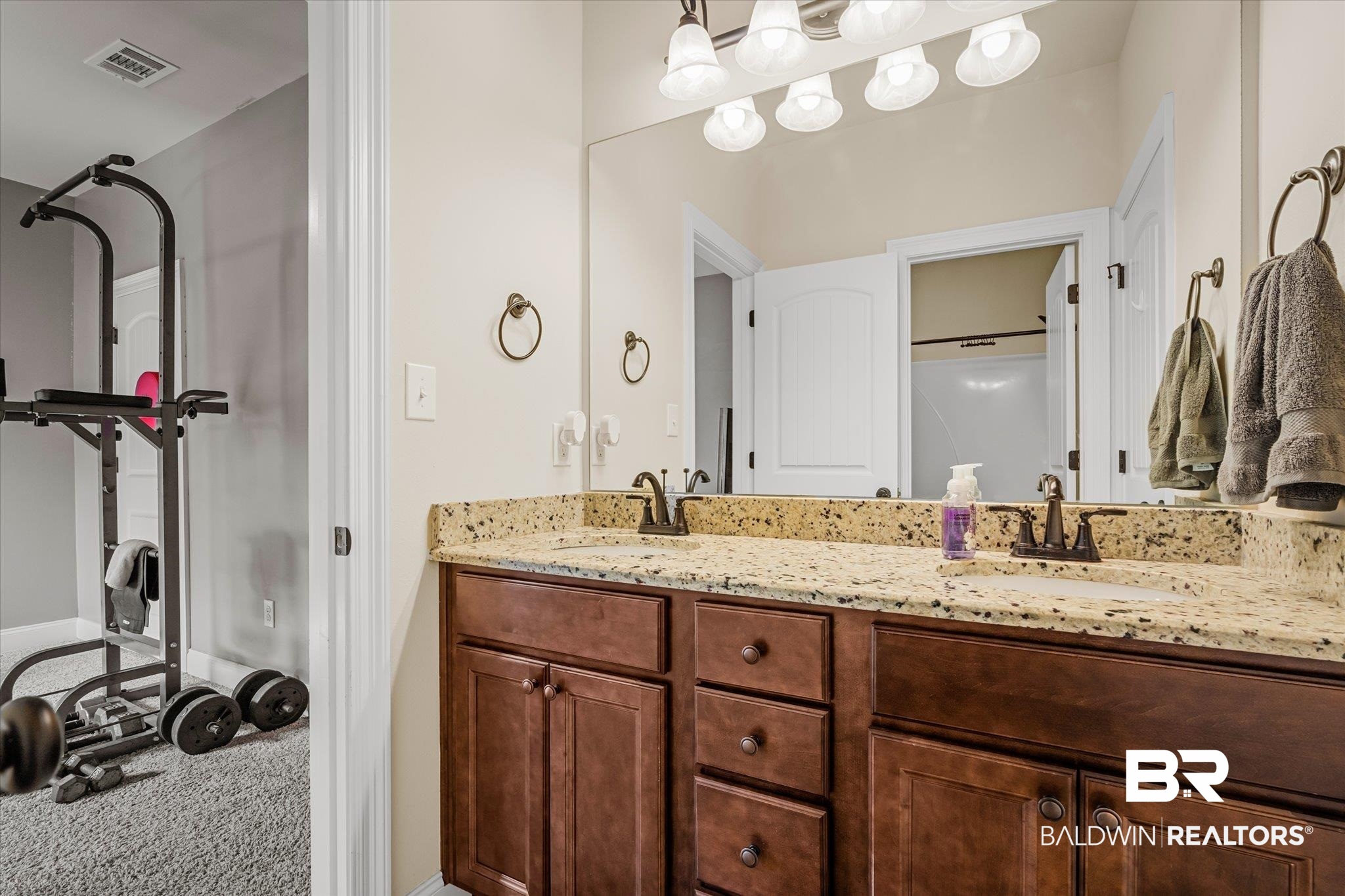 9912 Dunleith Loop Daphne, AL 36526 - Photo 13 of 23 Full bathroom with double vanity and carpet