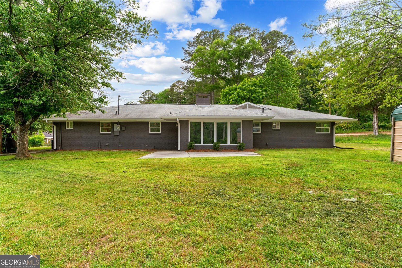 552 Dantzler Circle Dalton, GA 30721 - Photo 3 of 20 a front view of a house with a garden