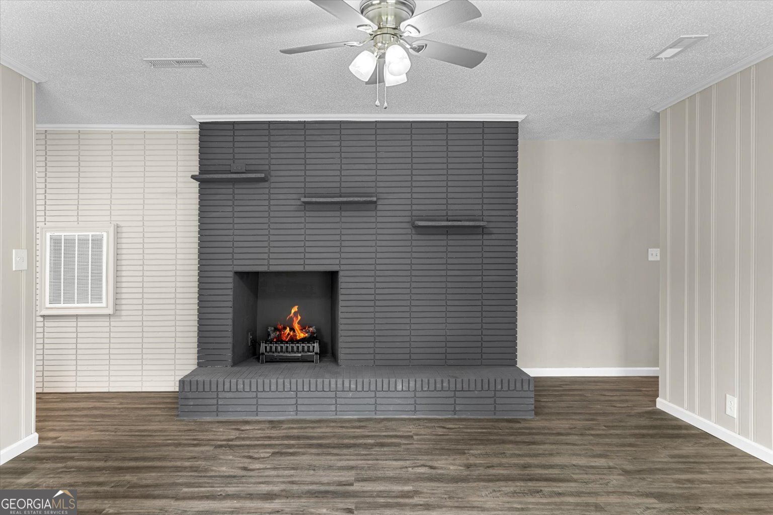 552 Dantzler Circle Dalton, GA 30721 - Photo 7 of 20 a living room with furniture and a fireplace