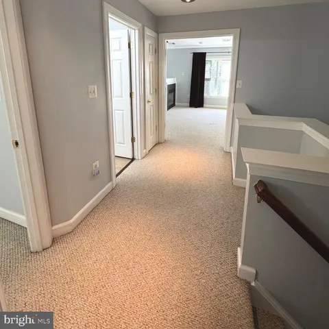 a bathroom with a sink toilet and mirror