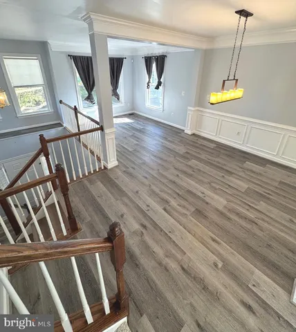 a view of a swimming pool and a chair
