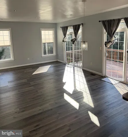 a kitchen with stainless steel appliances granite countertop a stove a sink dishwasher a refrigerator and a oven