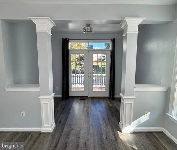a kitchen with kitchen island granite countertop stainless steel appliances and a counter top space