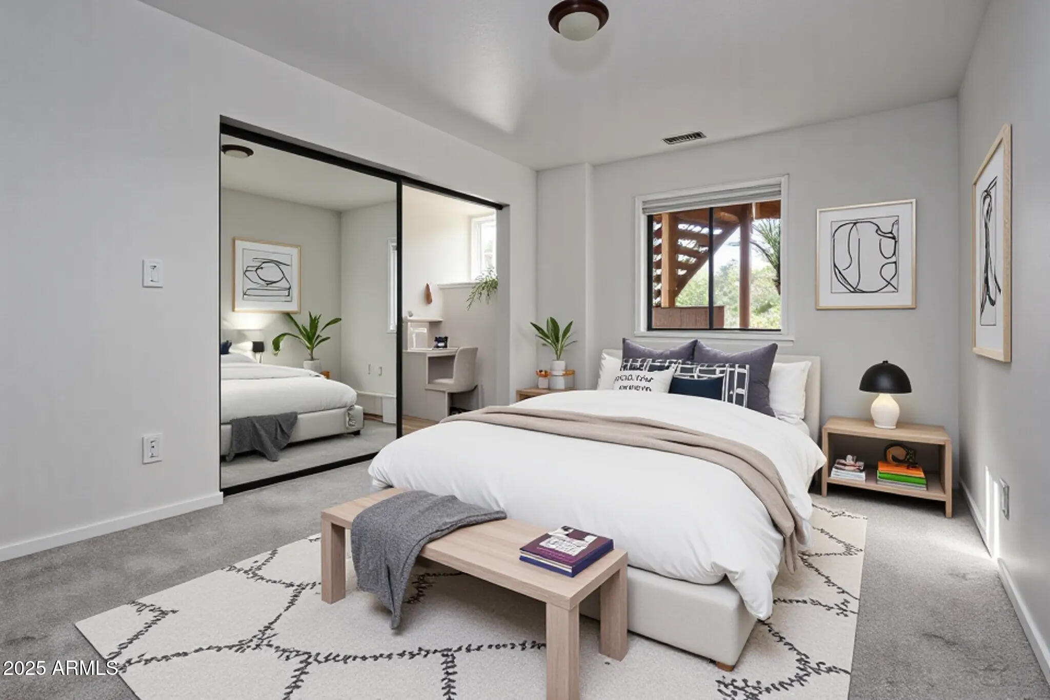 1050 Lee Mountain Road Sedona, AZ 86351 - Photo 14 of 78 a bedroom with a bed and wooden floor
