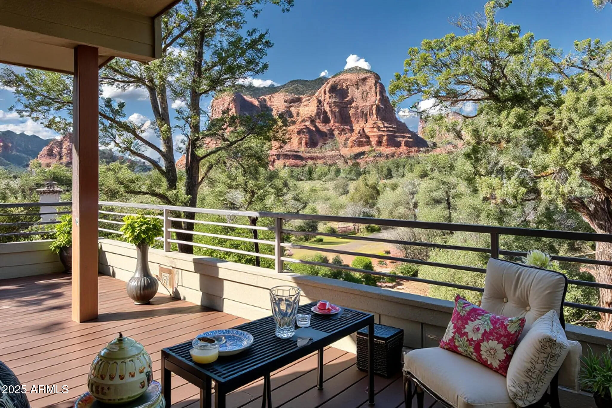 1050 Lee Mountain Road Sedona, AZ 86351 - Photo 17 of 78 a view of a chairs and table in a balcony