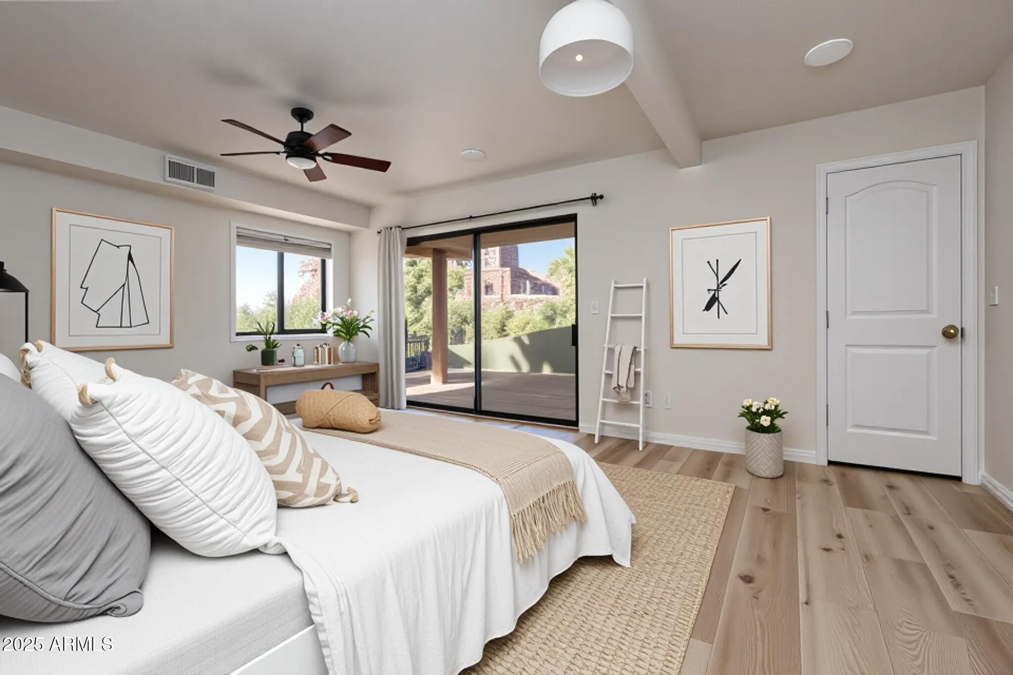 1050 Lee Mountain Road Sedona, AZ 86351 - Photo 16 of 80 a bedroom with bed and wooden floor