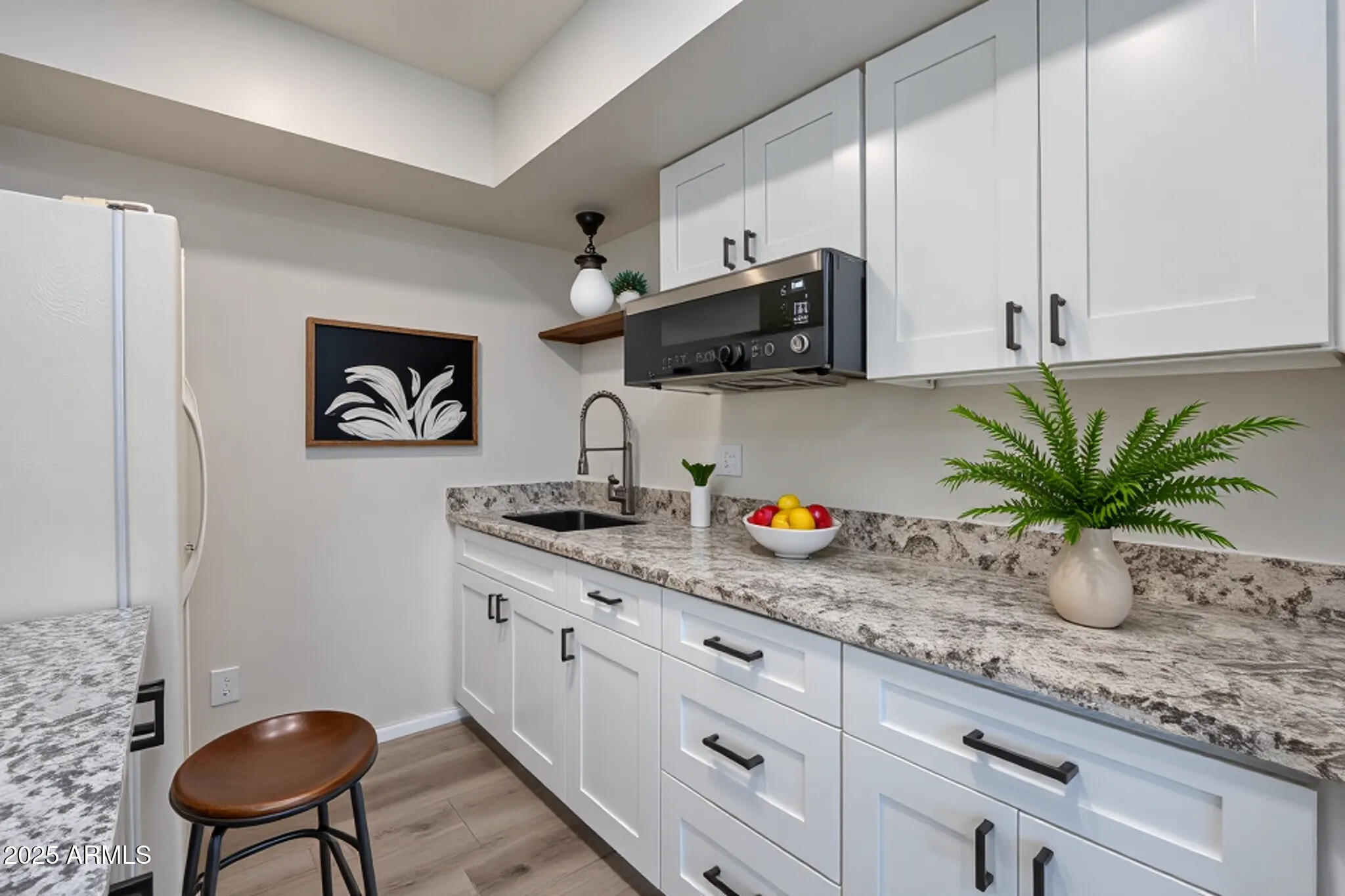 1050 Lee Mountain Road Sedona, AZ 86351 - Photo 18 of 78 a kitchen with sink and cabinets