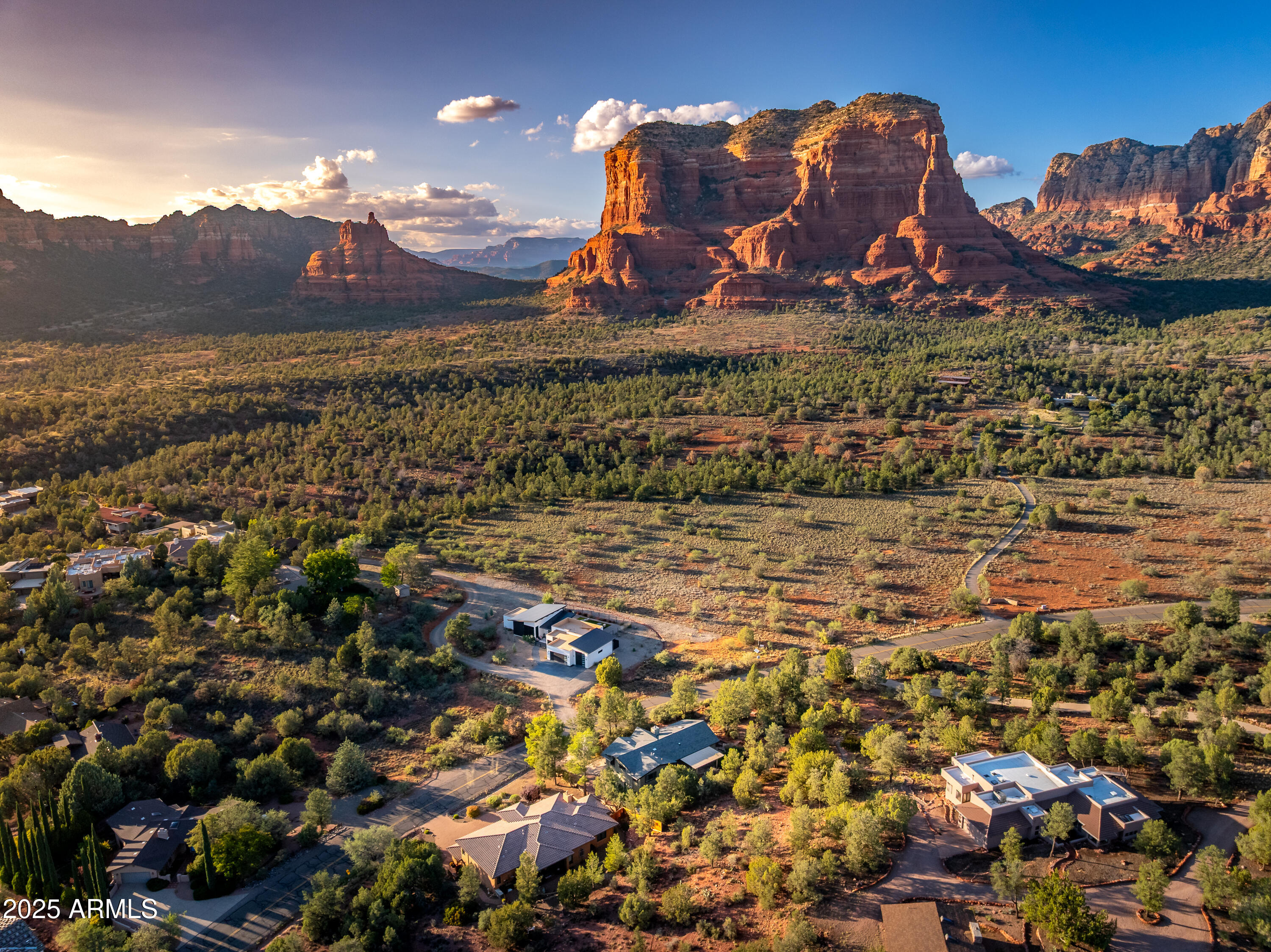 1050 Lee Mountain Road Sedona, AZ 86351 - Photo 21 of 80 an aerial view of a house with a garden and outdoor seating