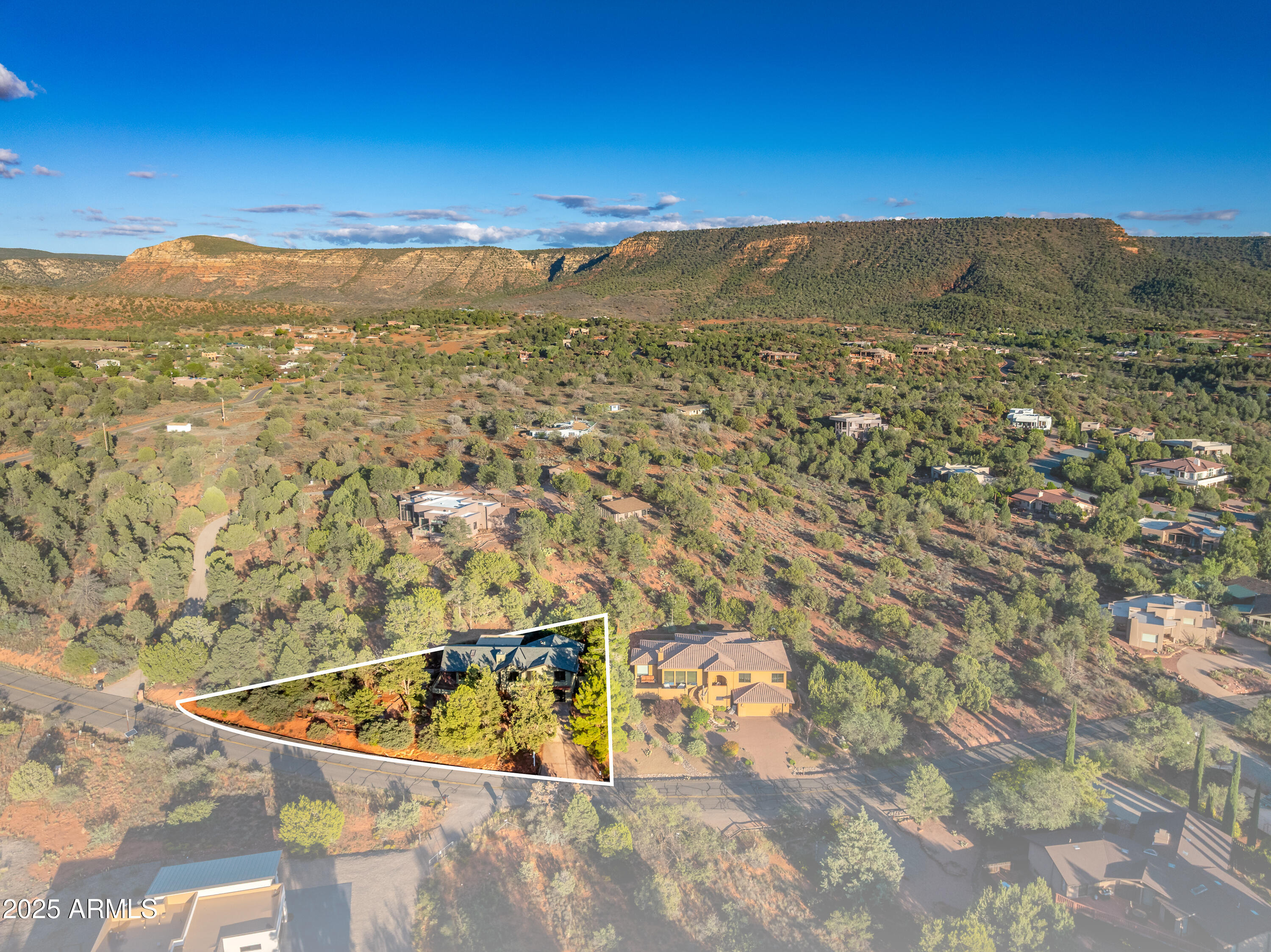 1050 Lee Mountain Road Sedona, AZ 86351 - Photo 22 of 80 a view of a city and mountains in the background