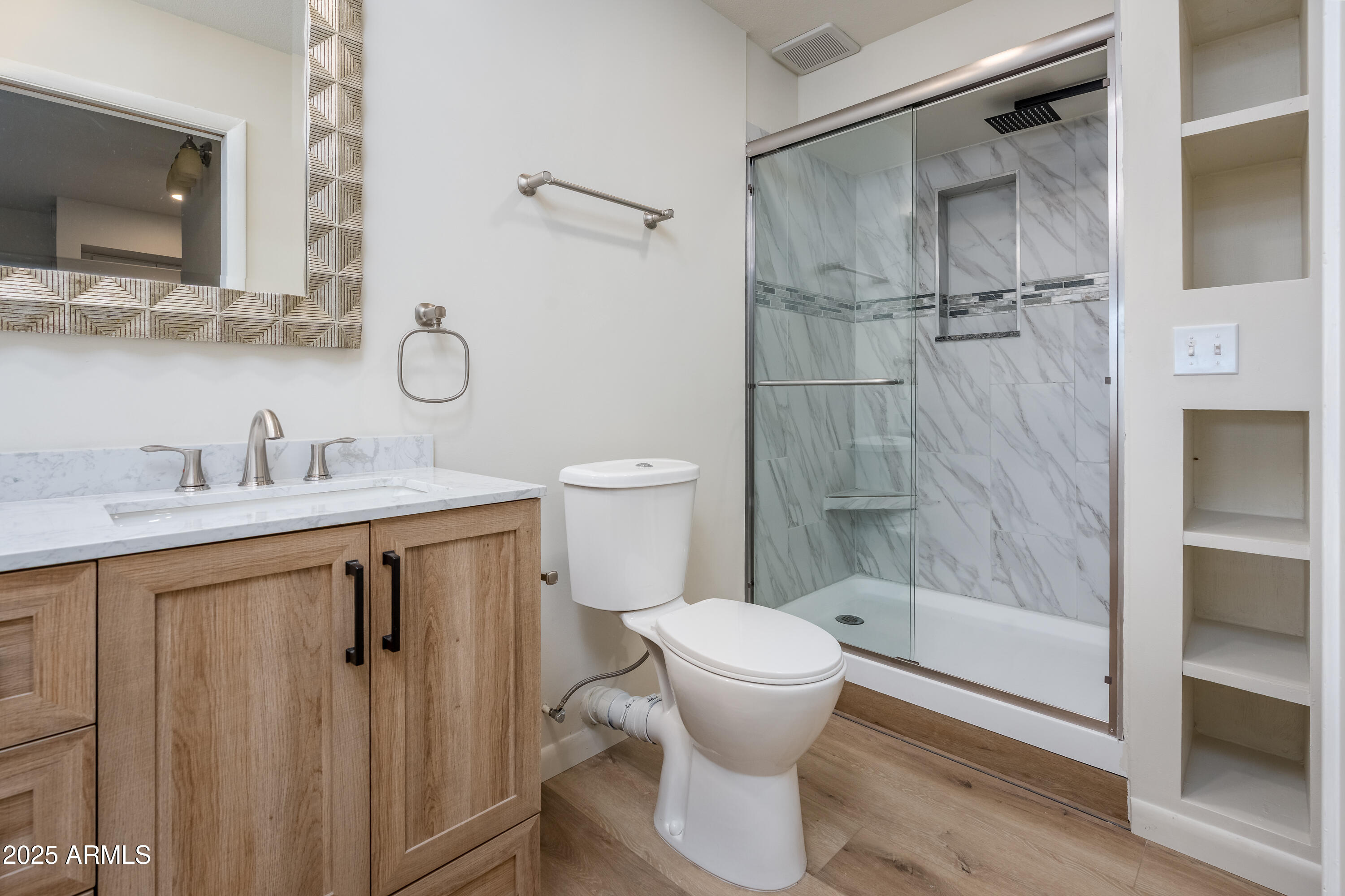 1050 Lee Mountain Road Sedona, AZ 86351 - Photo 29 of 78 a bathroom with a shower sink vanity and toilet