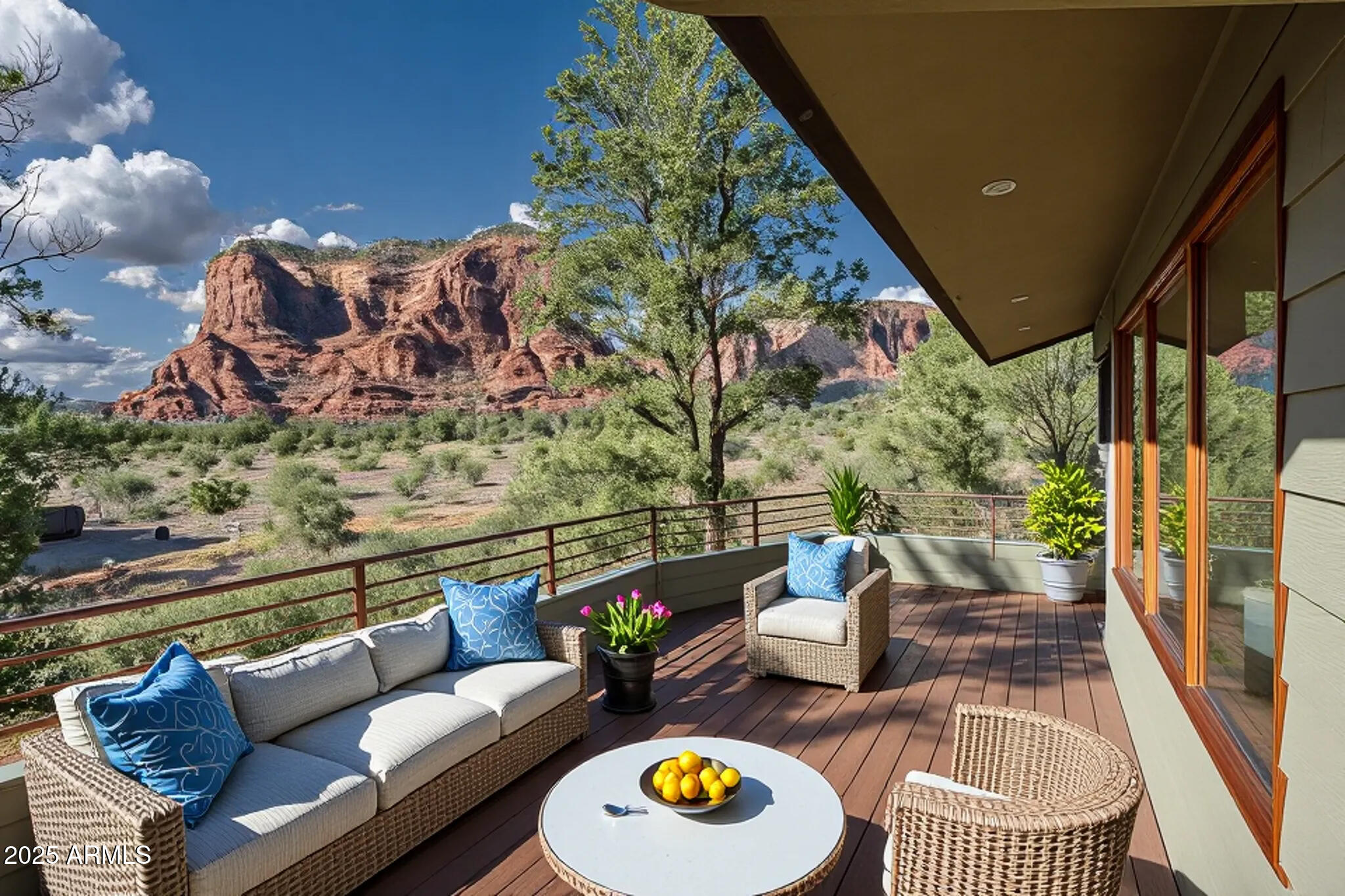 1050 Lee Mountain Road Sedona, AZ 86351 - Photo 2 of 80 a view of a chairs and table in the balcony