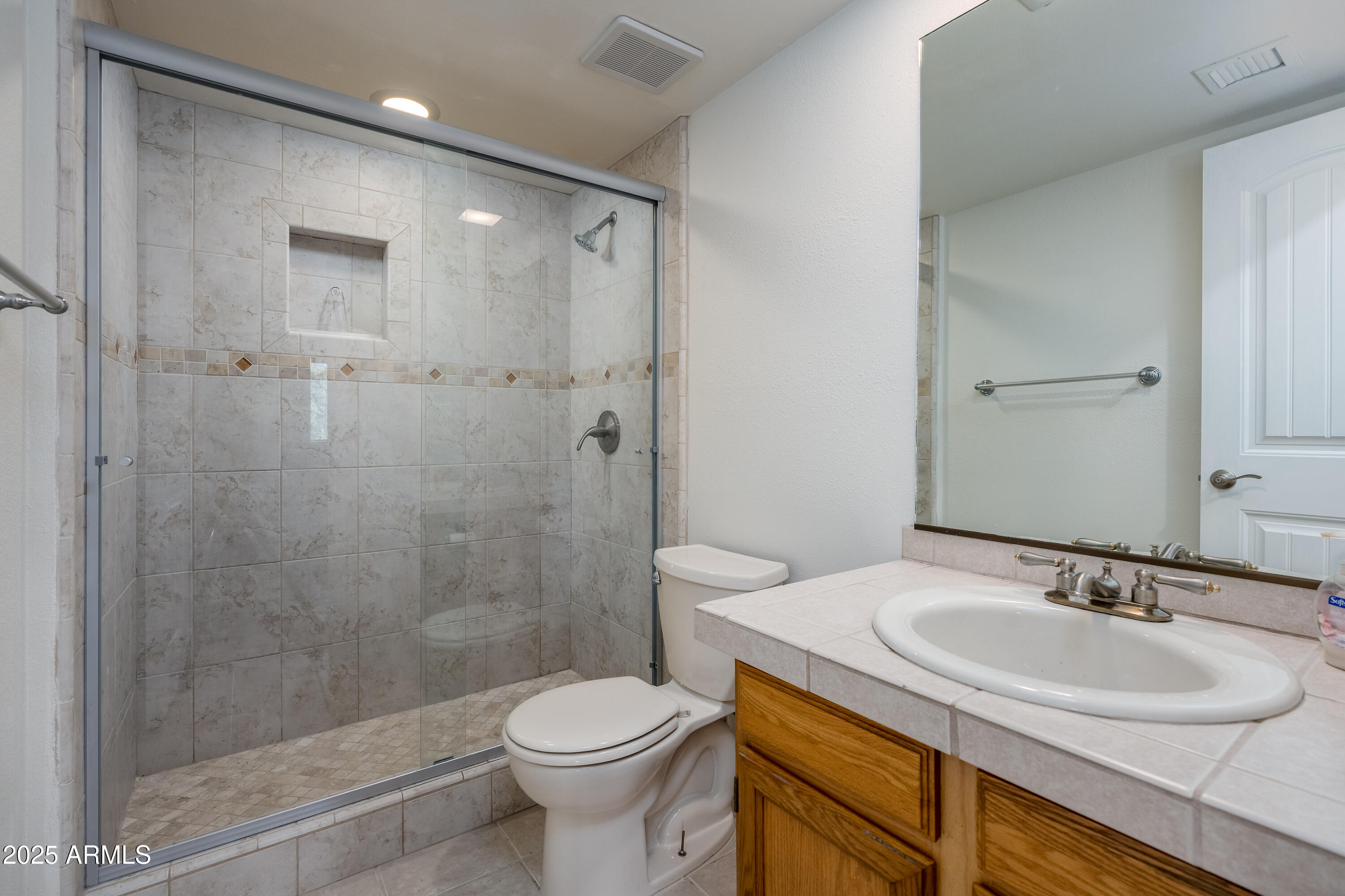 1050 Lee Mountain Road Sedona, AZ 86351 - Photo 45 of 78 a bathroom with a sink a toilet and shower