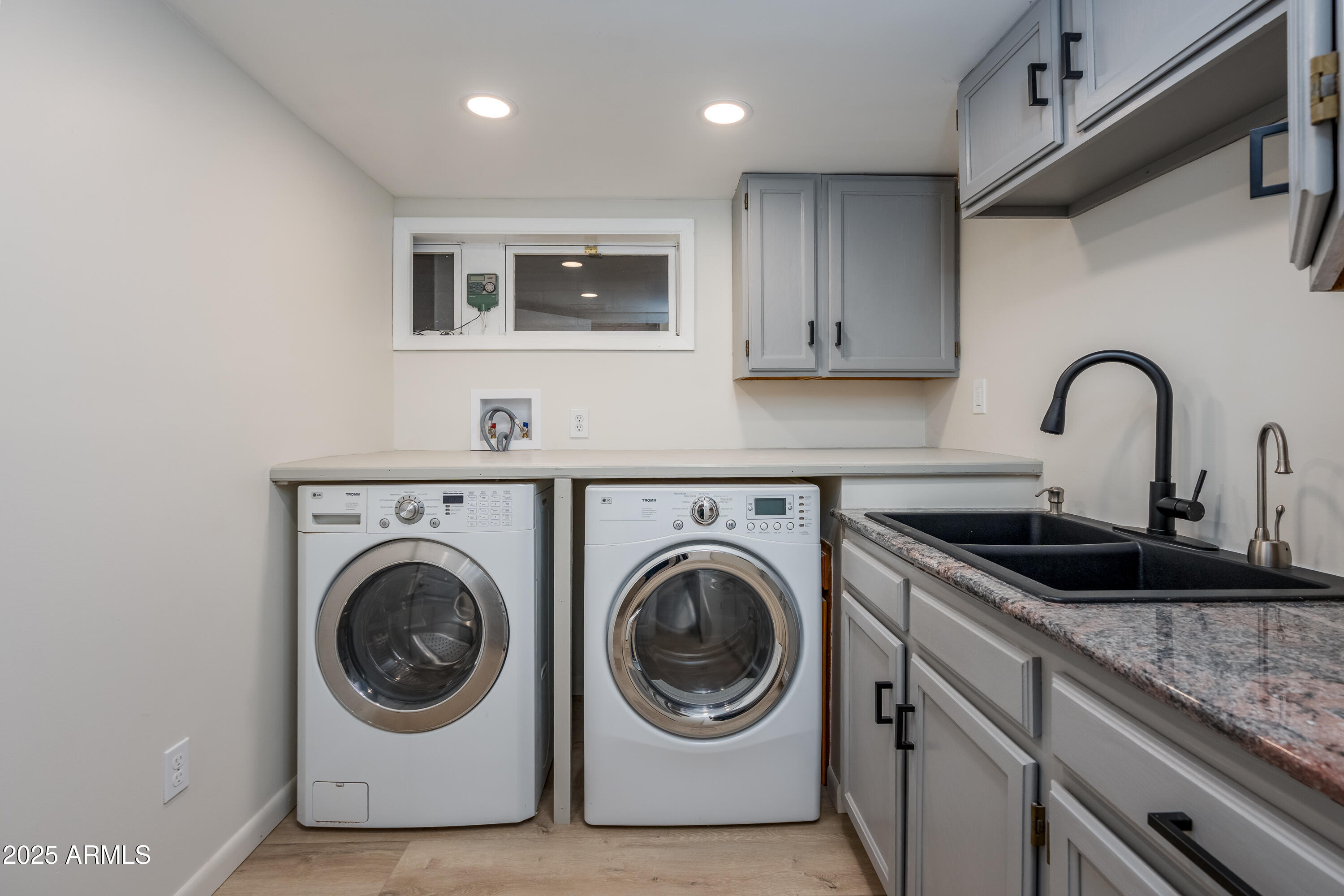 1050 Lee Mountain Road Sedona, AZ 86351 - Photo 47 of 78 a utility room with sink dryer and washer