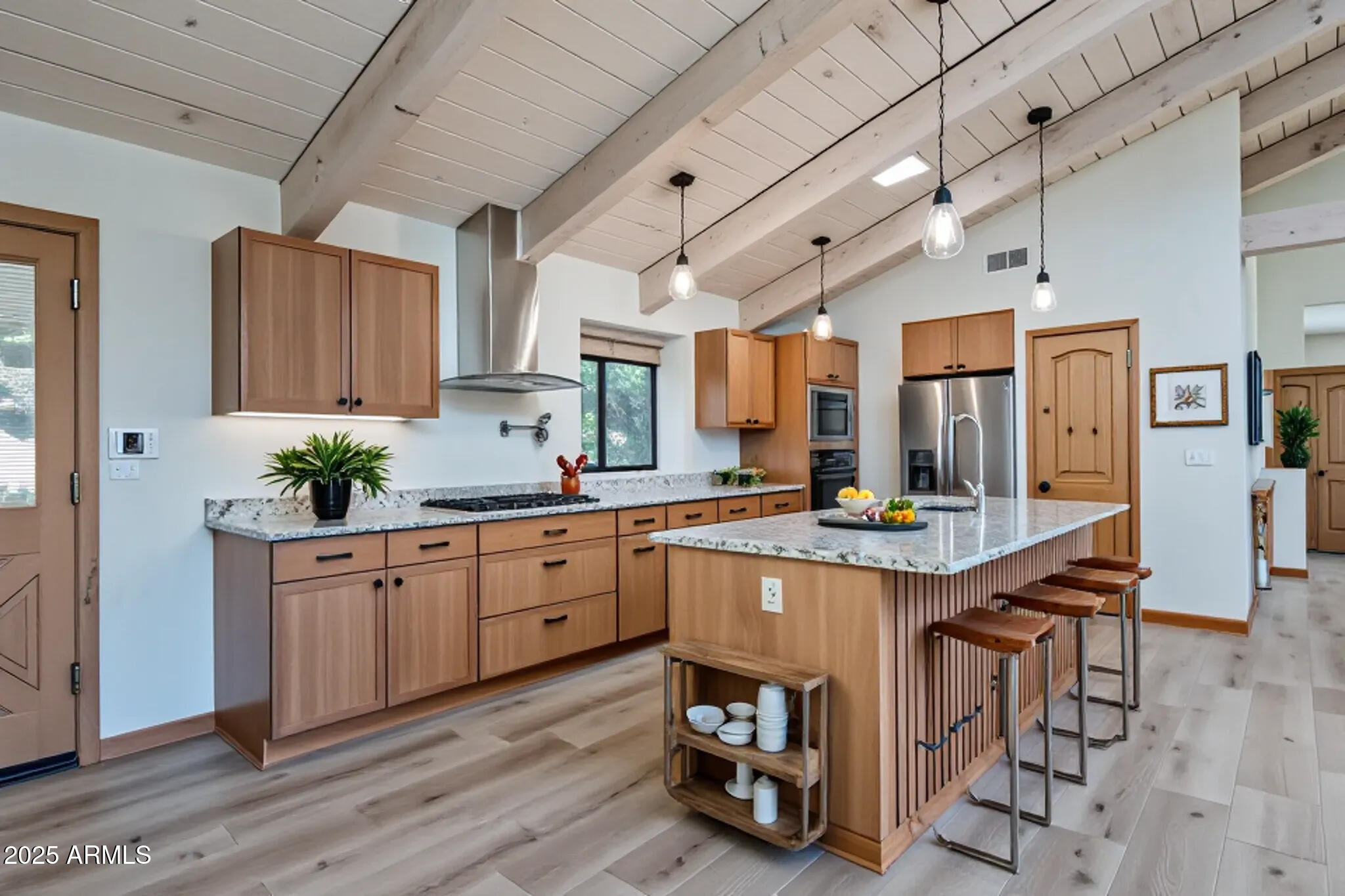 1050 Lee Mountain Road Sedona, AZ 86351 - Photo 5 of 78 a kitchen with stainless steel appliances granite countertop a sink and cabinets