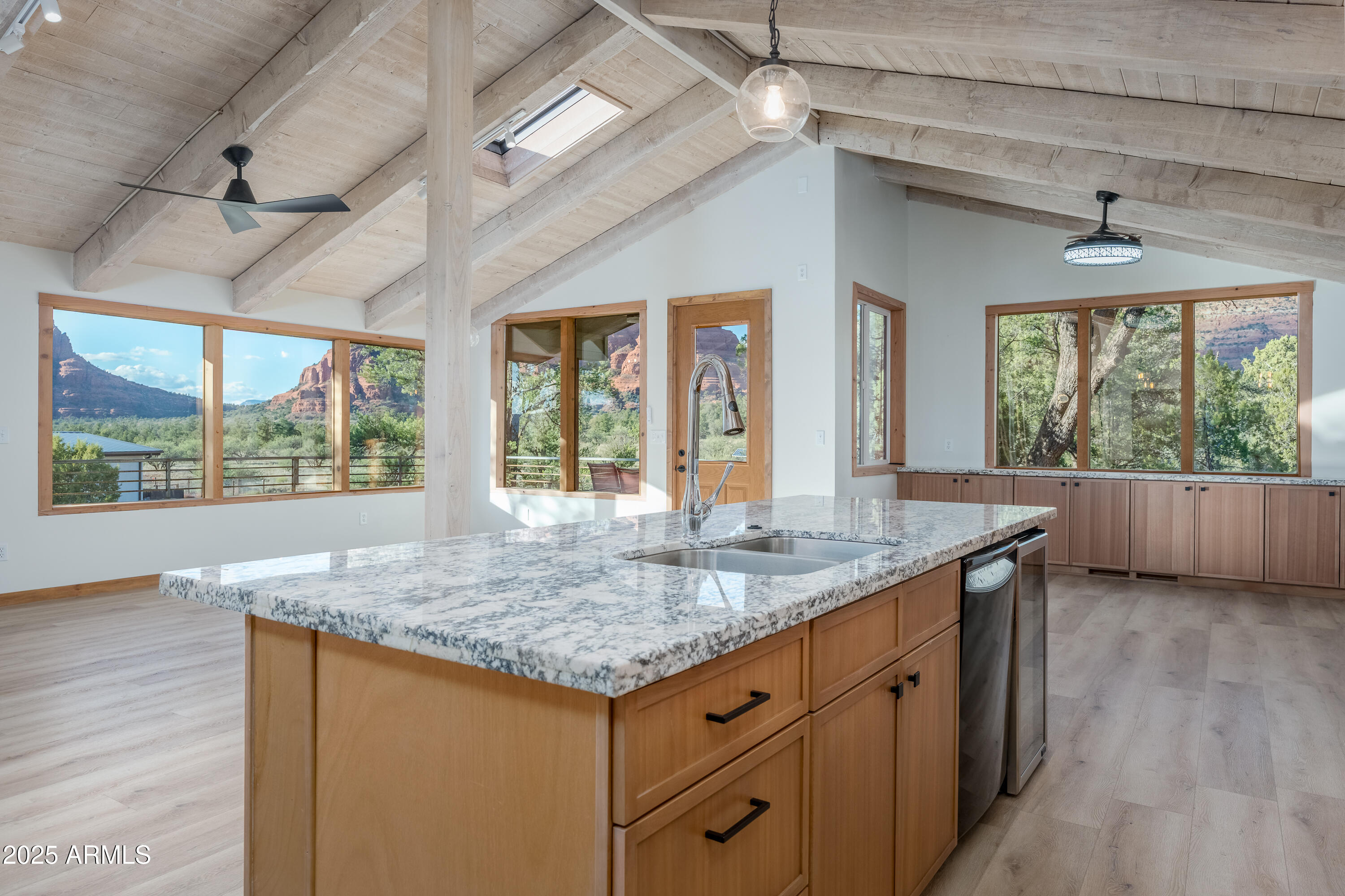 1050 Lee Mountain Road Sedona, AZ 86351 - Photo 65 of 78 a kitchen with granite countertop attached top oven and granite counter tops