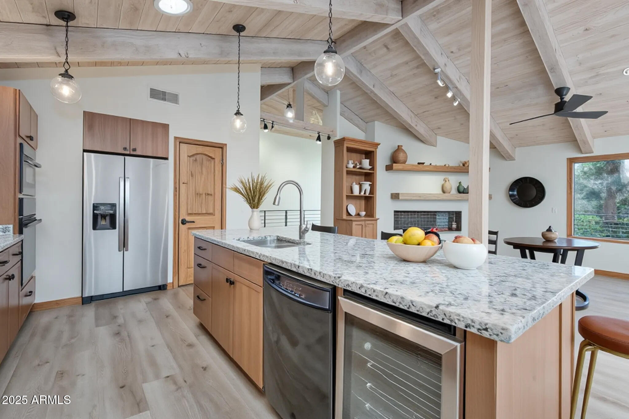 1050 Lee Mountain Road Sedona, AZ 86351 - Photo 6 of 80 a kitchen with sink and refrigerator
