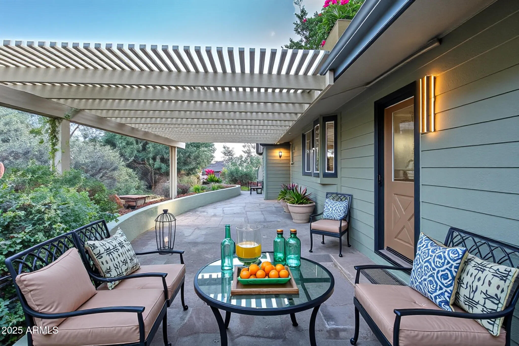 1050 Lee Mountain Road Sedona, AZ 86351 - Photo 9 of 78 a outdoor living space with furniture and a potted plant