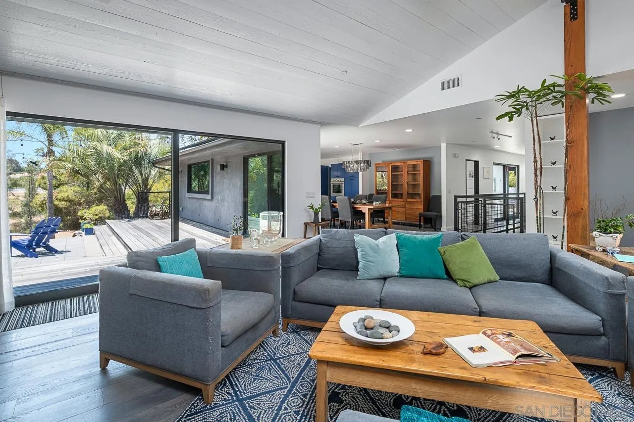 17436 Rancho Del Rio Rancho Santa Fe, CA 92067 - Photo 5 of 44 a living room with furniture and a large window