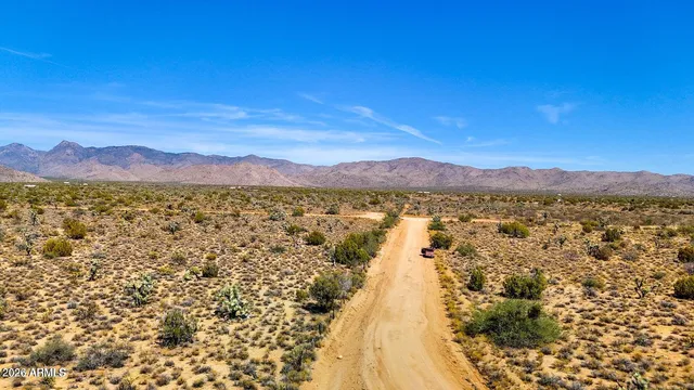 a view of an outdoor space with mountain