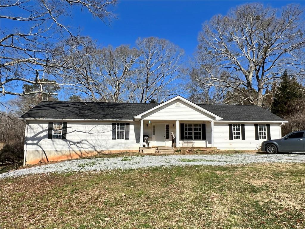 6112 Cool Springs Road Gainesville, GA 30506 - Photo 1 of 1 a front view of a house with a yard