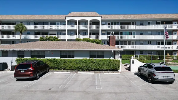 a car parked in front of a building