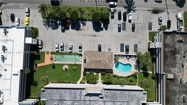 a view of living room kitchen and windows