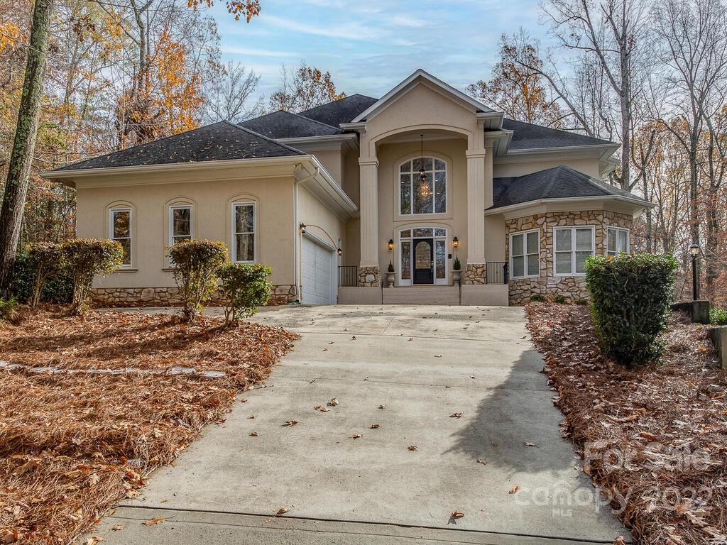 4101 High Ridge Road Charlotte, NC 28270 - Photo 1 of 38 a front view of a house with a yard