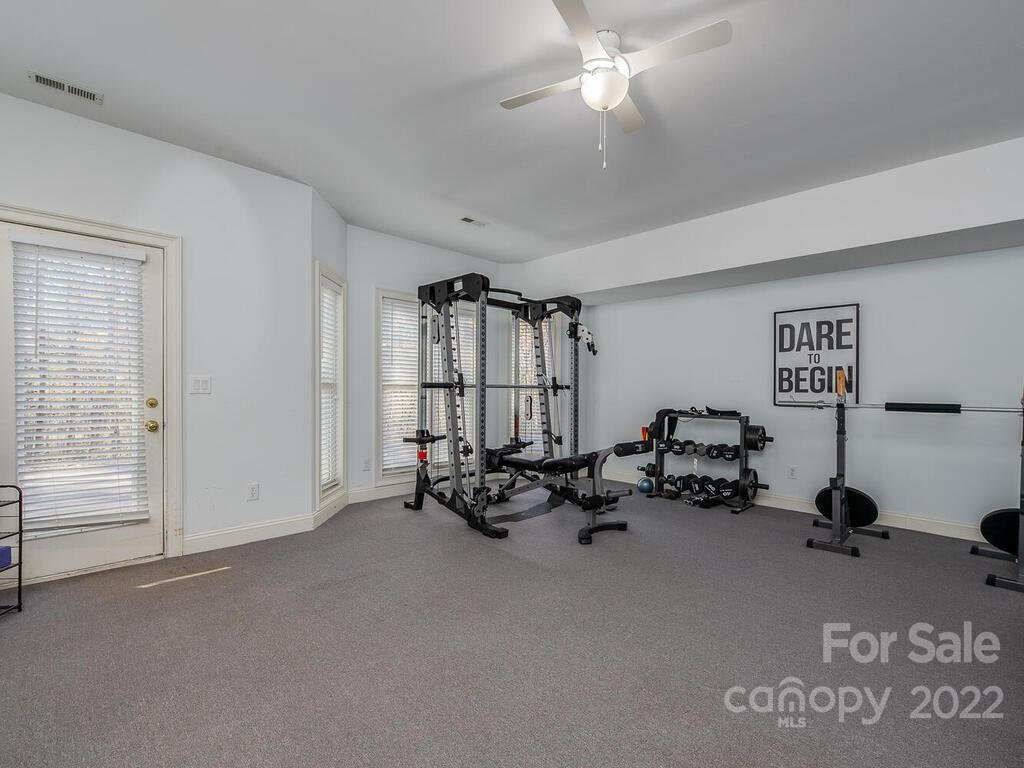 4101 High Ridge Road Charlotte, NC 28270 - Photo 25 of 38 a view of a room with gym equipment