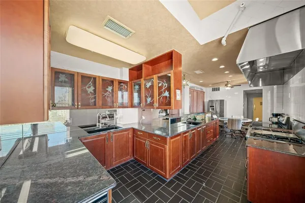 a view of a terrace with a table and chairs