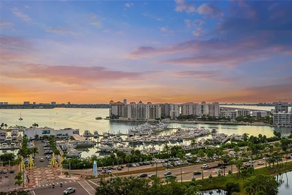 a view of a livingroom with furniture and stairs