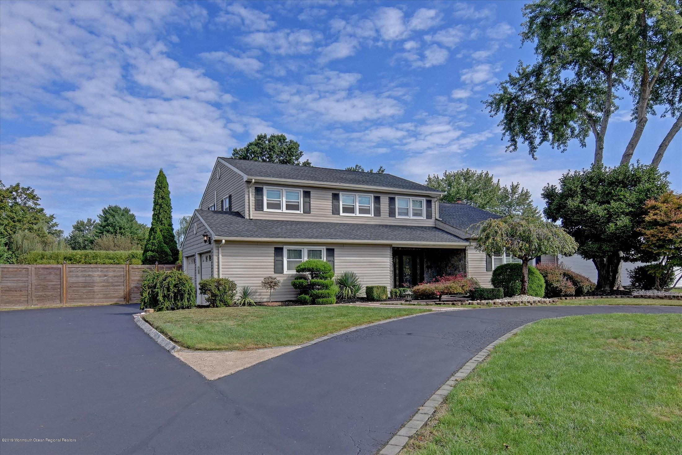 244 Elton Adelphia Road Freehold, NJ 07728 - Photo 2 of 46 a front view of a house with a yard